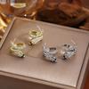 Exquisite Diamond-Encrusted Silver Snake Earrings – Luxurious, Unique Design with a Modern Style.