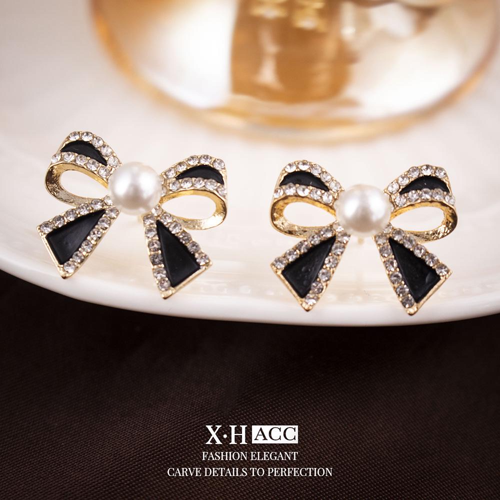 Elegant Gold-Plated Black Zircon Stud Earrings - Niche Design for a Luxurious Fashion Statement