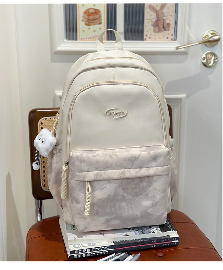 School bag 2025 new tie-dye backpack Korean version fashionable and cute large-capacity school bag casual simple backpack