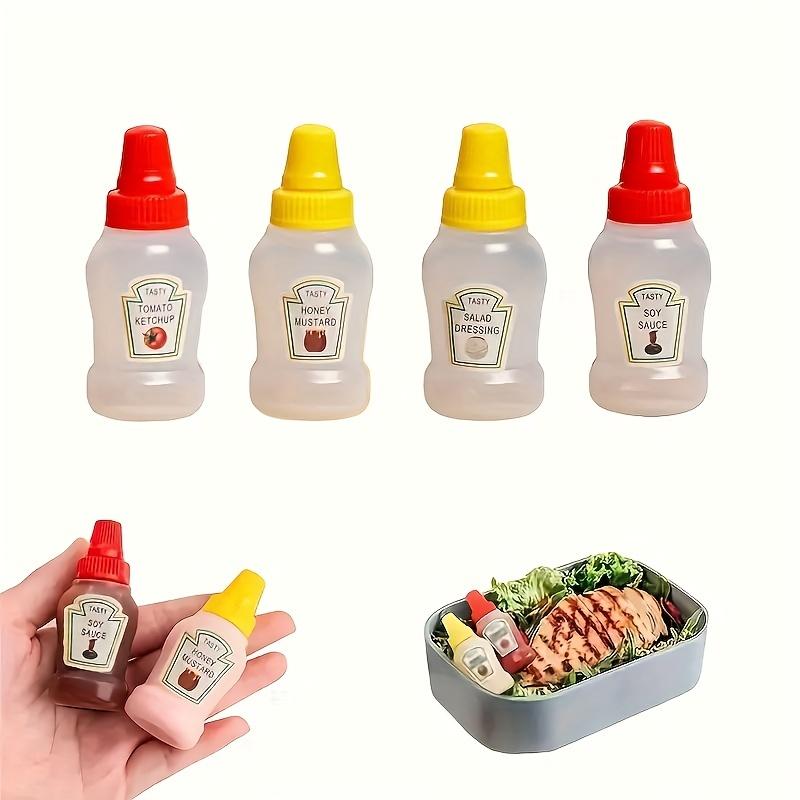 

4 mini picnic portable tomato soy sauce bottles, honey squeeze sauce bottles