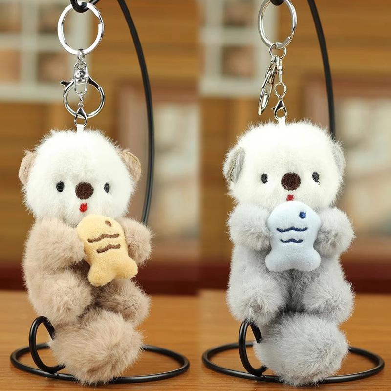 2pcs Fashion Lovely Plush Otters Holding Fish Key Chains Cartoon Cute Otters School Bag Pendant Keyring Funny Toy Student Gifts