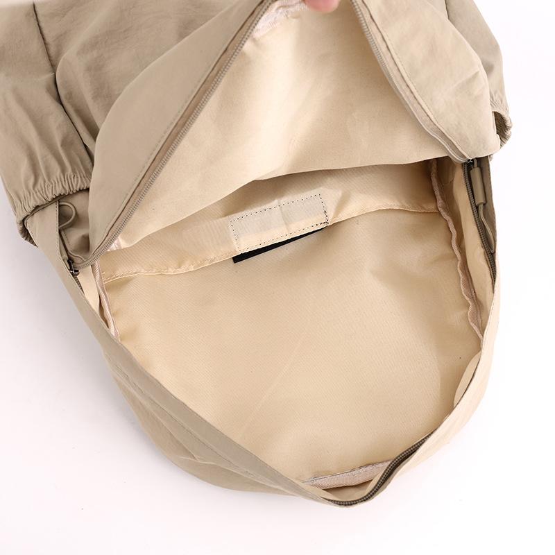 Solid color nylon backpack large capacity casual simple college students men and women with the same versatile lightweight backpack