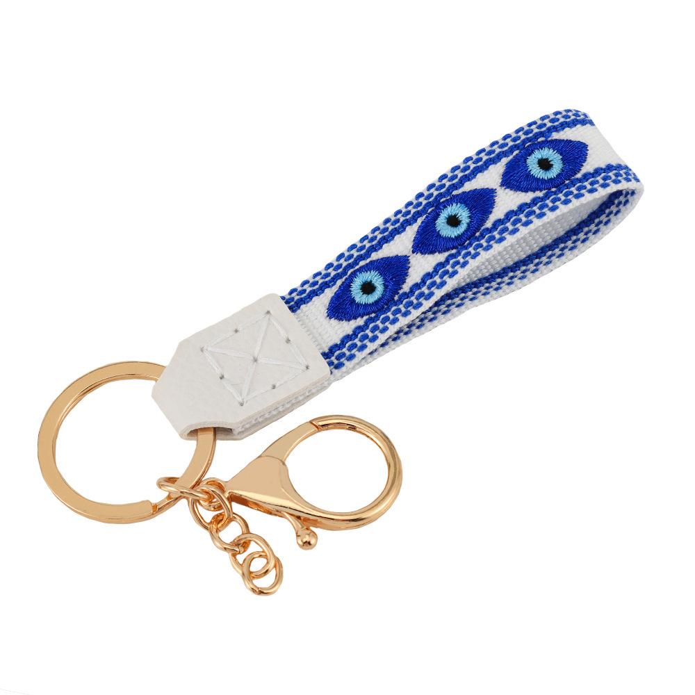 

Handmade Blue Evil Eye Embroidered Leather Keychain for Women