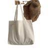 Niche Design, Large Capacity Canvas Bag with Artistic Appeal