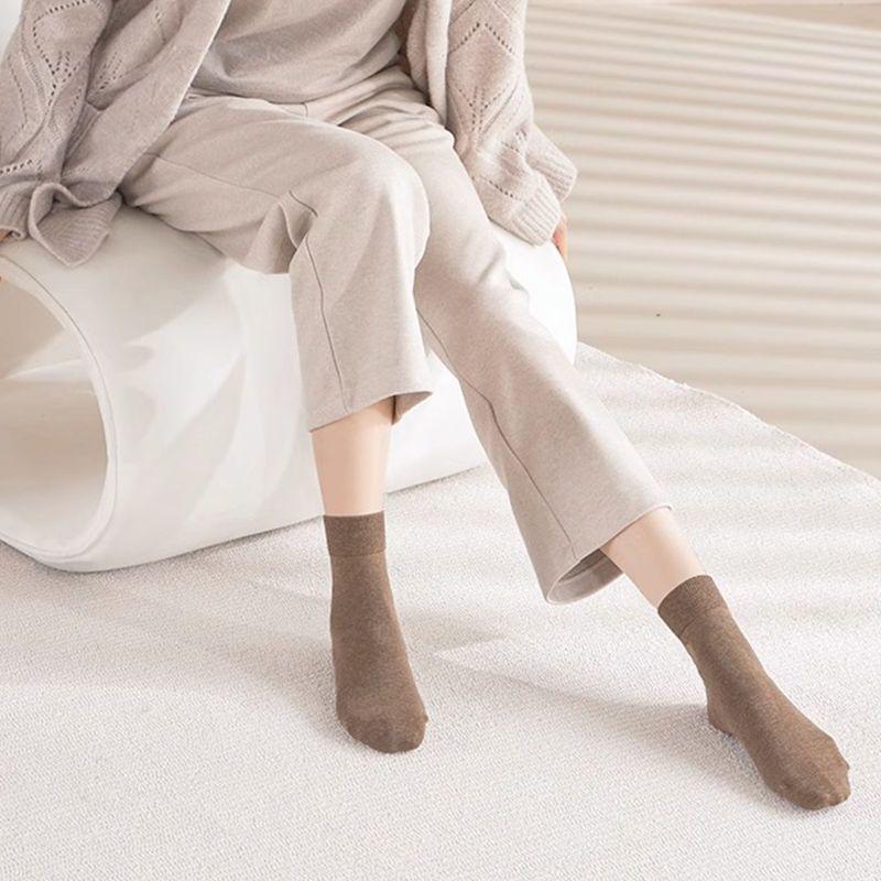 Xinjiang Women's Cotton Mid-Calf Socks - Warm, Trendy, Versatile, Solid Color, Autumn/Winter Long Socks.