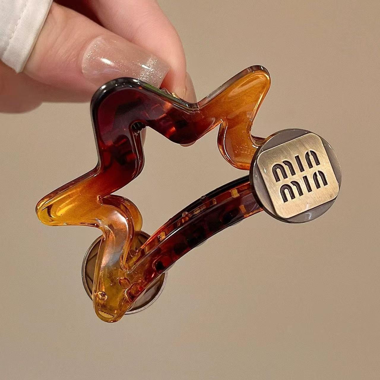 

Gold Star Hair Claw: Five-Pointed Clip for Women s High Ponytail & Updo - 2025 Collection