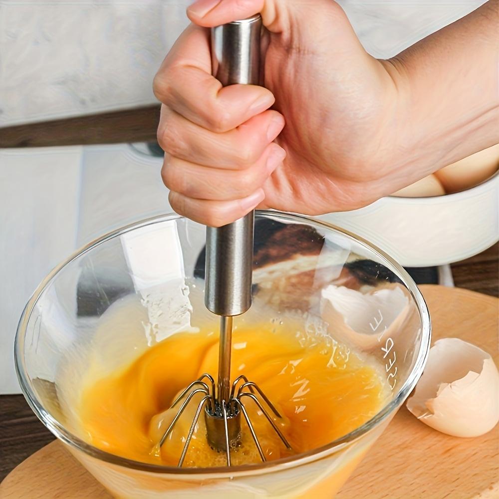 Ein praktischer Handmixer, geeignet für Sahne, Eier usw.. - die perfekte Wahl zum Backen und Kochen