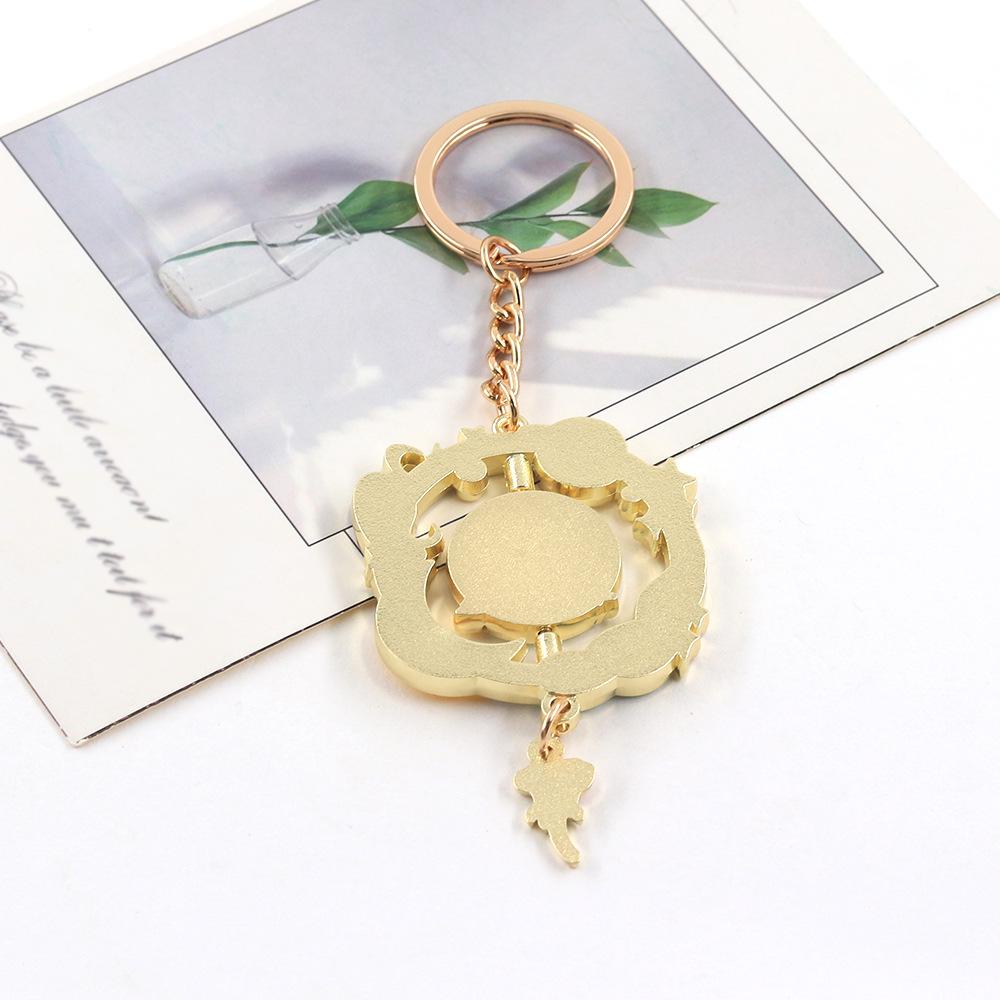 Breloc Planetă Micul Prinț cu Pandantiv Trandafir – Accesoriu de Modă Metalic Rotativ Creativ