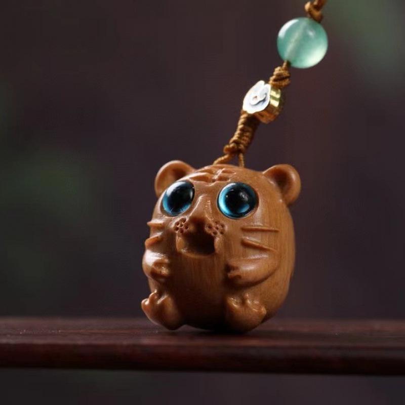 Twelve Zodiac Animal Charms Green Sandalwood Set: Rat, Ox, Tiger, Rabbit, Dragon, Snake, Horse, Sheep, Monkey, Rooster, Dog, Pig.