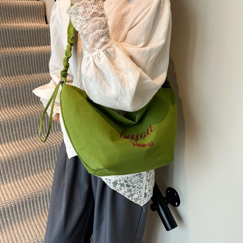 Large-capacity niche design personalized bag women's 2025 fashion commuter dumpling bag Korean simple single shoulder oblique span bag