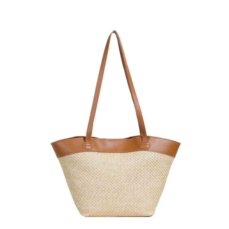 

Straw bag women s niche design 2024 new summer woven messenger bucket bag fashionable hollow seaside beach bag коричневий