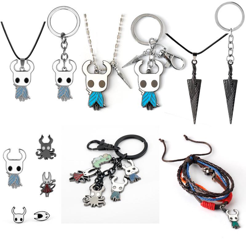 Hollow Knight Hlavní postava Hřebík Přívěsek na klíče Náhrdelník & Kovová brož Sada