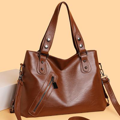 Torba typu tote ma dużą pojemność i można ją nosić na ukos. To jest Retro, Wszechstronna i Luksusowa Jednoramienna Torebka