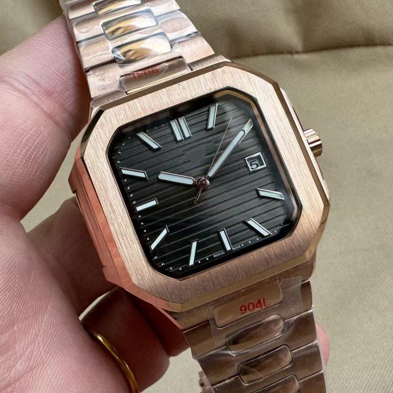 Patek Philippe Nautilus 5821 Men's Gold Automatic Mechanical Watch with Large Dial and Calendar.