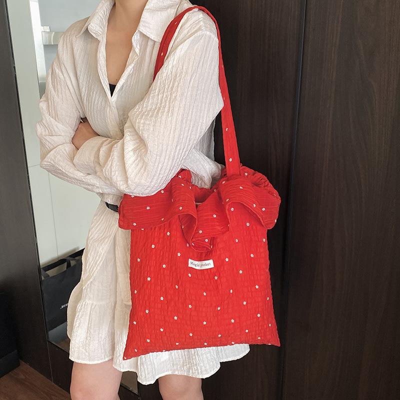 Korean version of Harajuku ins small flower embroidery contrasting color women's shopping bag new simple and exquisite shoulder armpit bag
