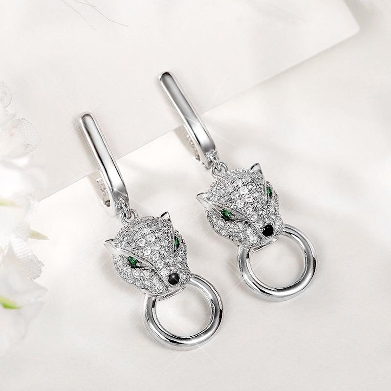 Leopardenkopf-Kupferohrringe mit grünen Augen - Elegante Statement-Hänger für Damen