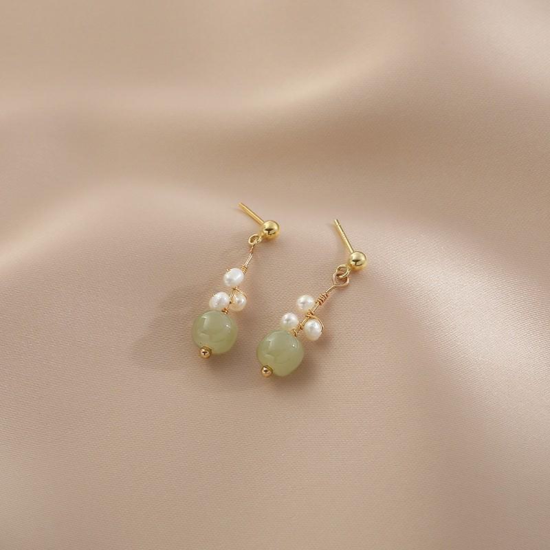 Chinese Jade Moon Tassel Earrings: Unique Design & Elegant Trend