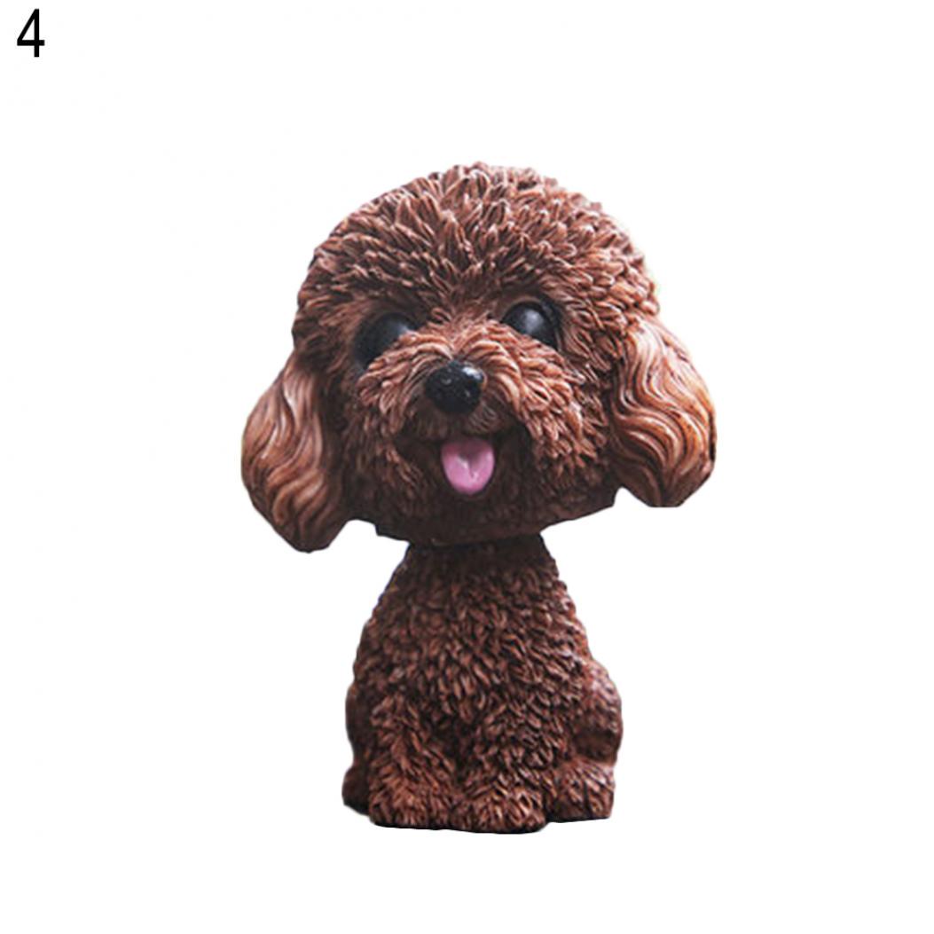 

Чудовий подарунок на приладовій панелі салону автомобіля, симулятор собаки, цуценя, що хитається головою