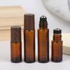 5ml 10ml Bursztynowe Przezroczyste Szklane Butelki Roll-on Plastikowa Nakrętka Imitująca Drewno Próbne Buteleczki z Kulka do Olejków Eterycznych Perfum