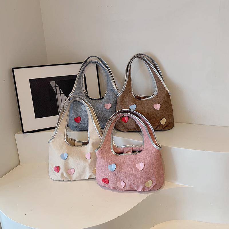 Korean version of fashion handbag women's bag new large-capacity PU bag niche high-texture shoulder armpit bag