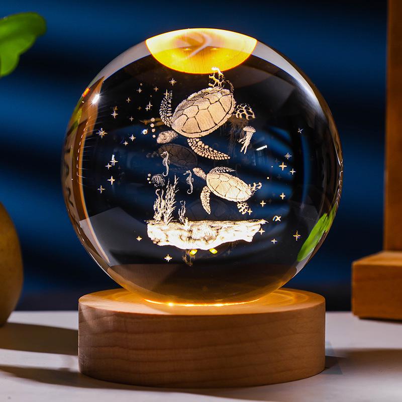 Flickering Crystal Ball Night Light with Engraved Solid Wood Base - Perfect as a Birthday Gift or Creative Graduation Ornament.