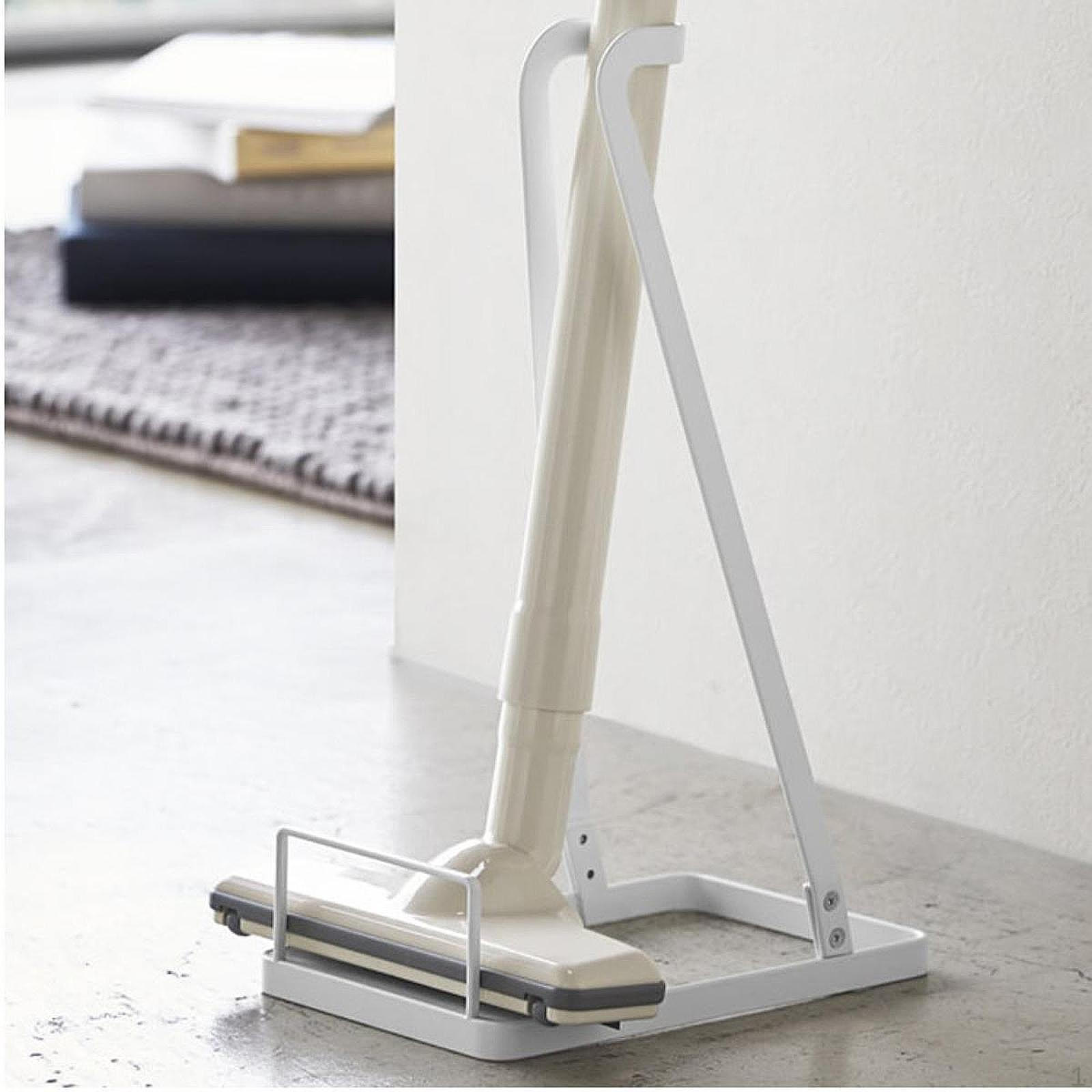 

Compact Vacuum Storage Stand for Home And Bathroom Organization білий