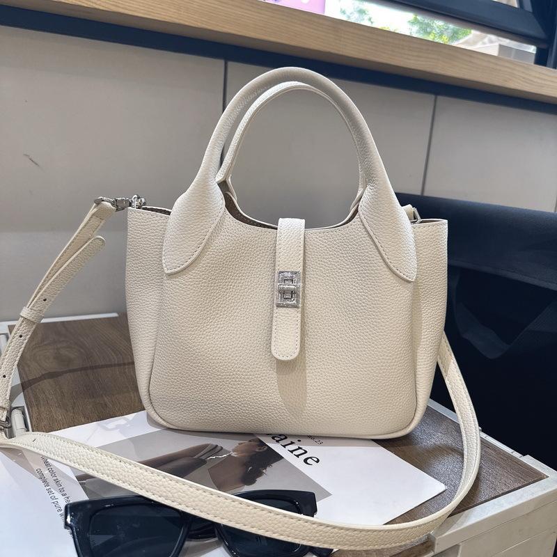 New Leather Women's Bag First Layer Cowhide Li Pattern Leather High-end Feeling Hand Carrying Bucket Bag Women's Lychee Pattern Basket Bag