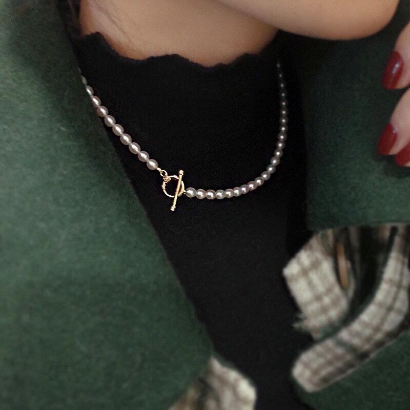 Light luxury retro natural freshwater pearl necklace women's niche high-end sense antique long millet bead sweater chain spring and autumn