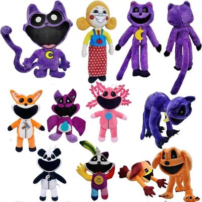 Monstro de terror, animal sorridente, brinquedo de pelúcia