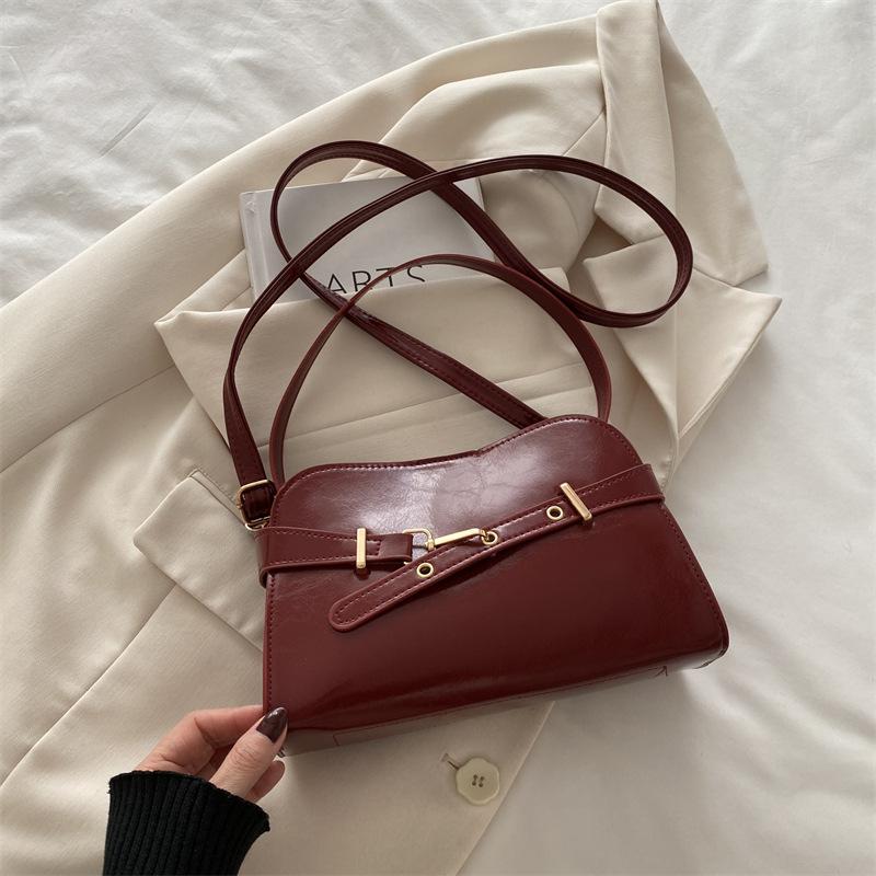 New shoulder bag 2025 spring and summer niche retro temperament women's shell bag fashion simple messenger high sense