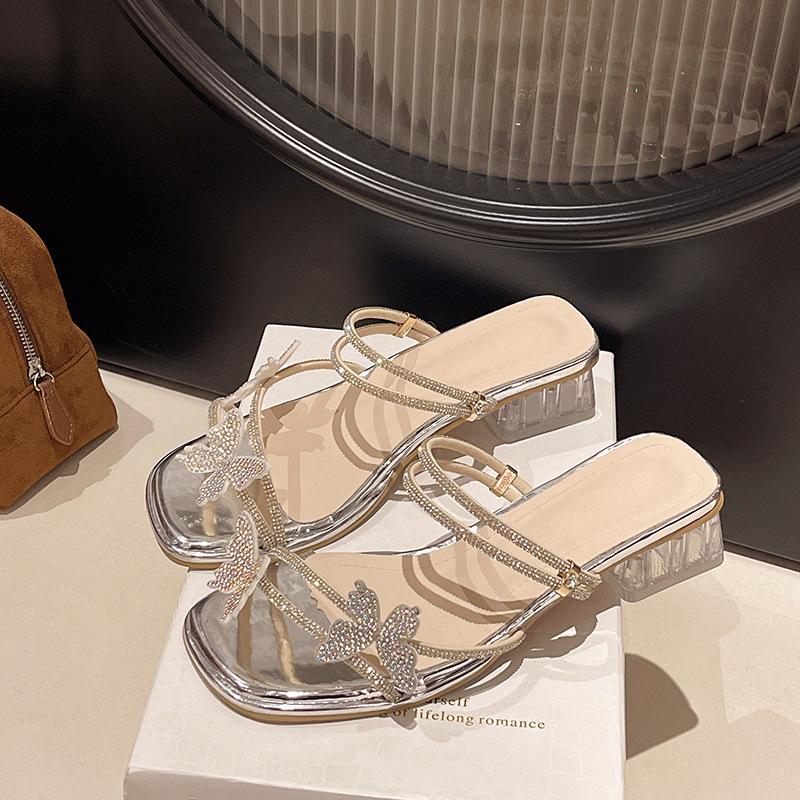 

Wear two high-heeled thick-heeled slippers with skirts, and women s new rhinestone crystal sandals for summer 2025. 40 серебряный