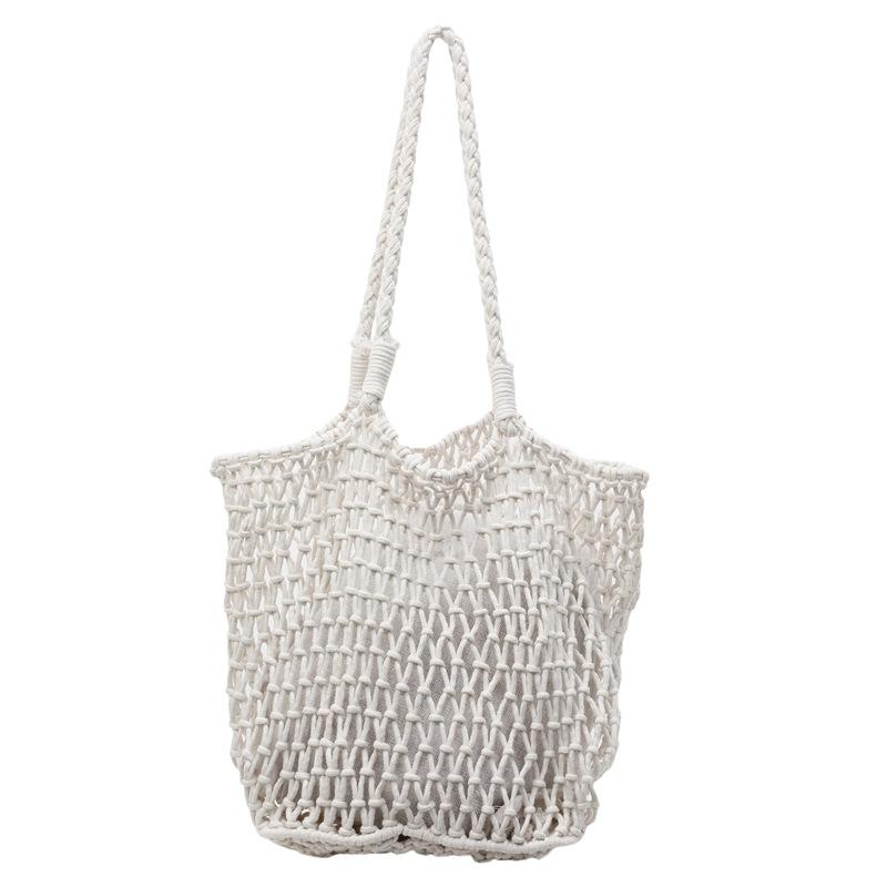 Borsa estiva in maglia traforata di nicchia da donna a grande capacità 2025 nuova borsa tote intrecciata borsa da spiaggia per le vacanze moda
