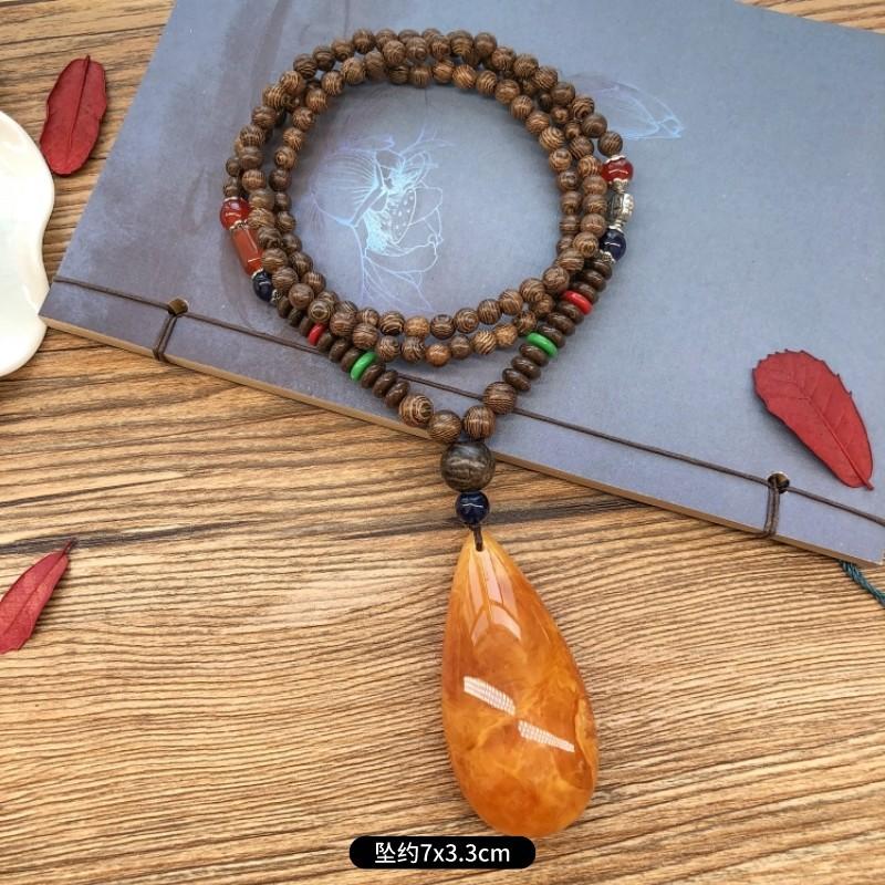 Retro chicken wing wood second generation old beeswax necklace men and women versatile amber pendant long sweater chain pendant