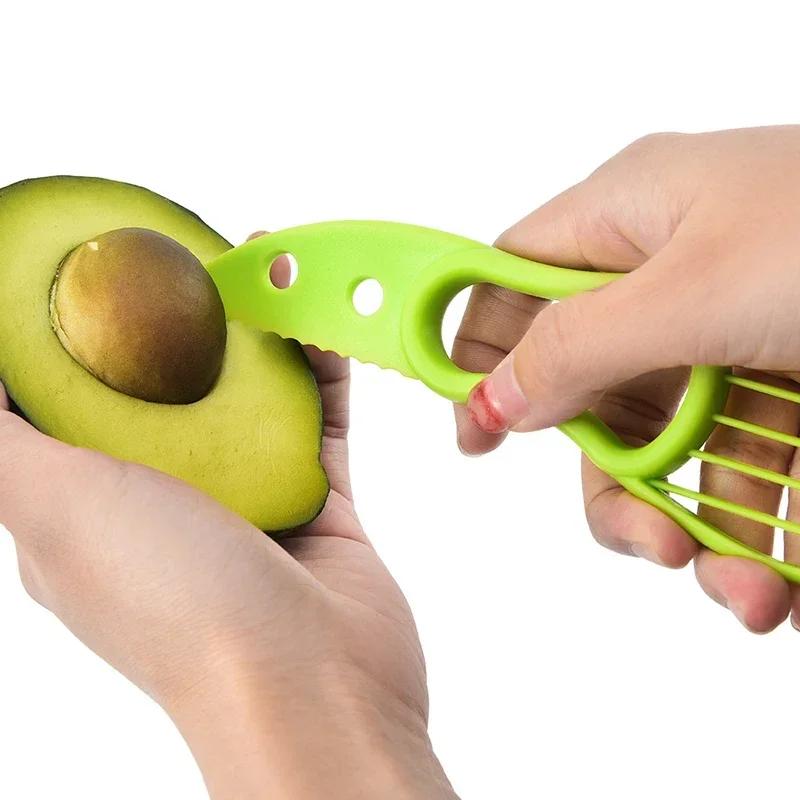 3 In 1 Avocado-Schneider Shea-Entkerner Butterfrucht-Schäler Schneider Fruchtfleisch-Separator Kunststoffmesser Küchengemüsewerkzeuge