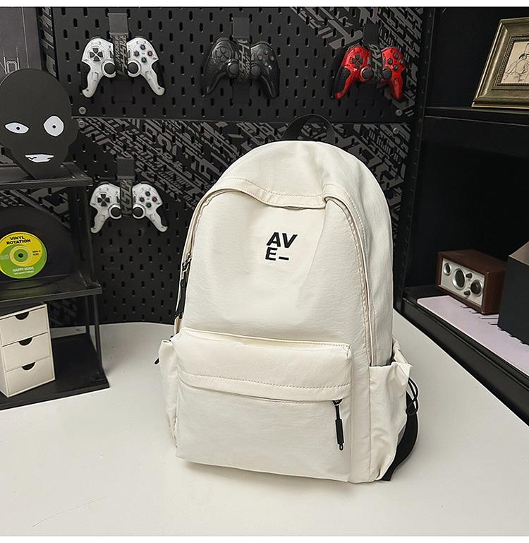School bag Korean version couple simple large-capacity backpack leisure commuting college student school bag niche light travel backpack
