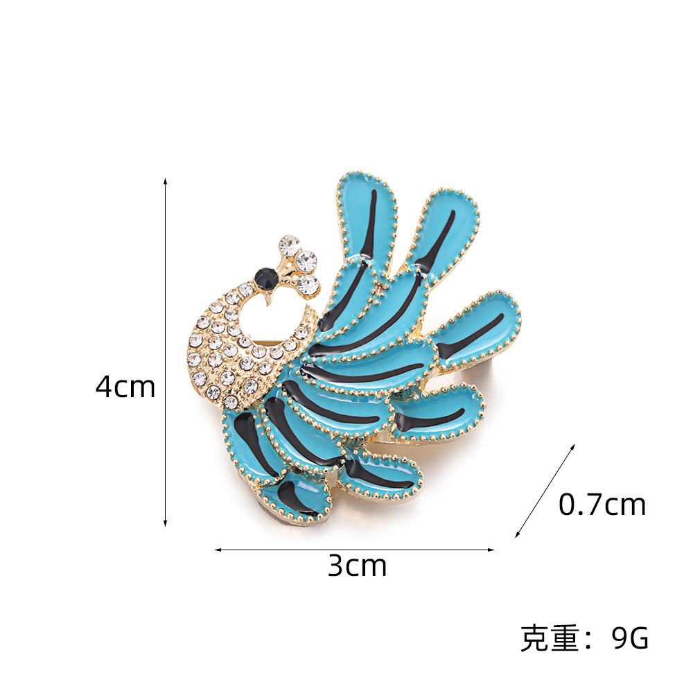 Creative and fashionable blue peacock brooch, temperament diamond-encrusted retro suit fixed accessories silk scarf buckle brooch