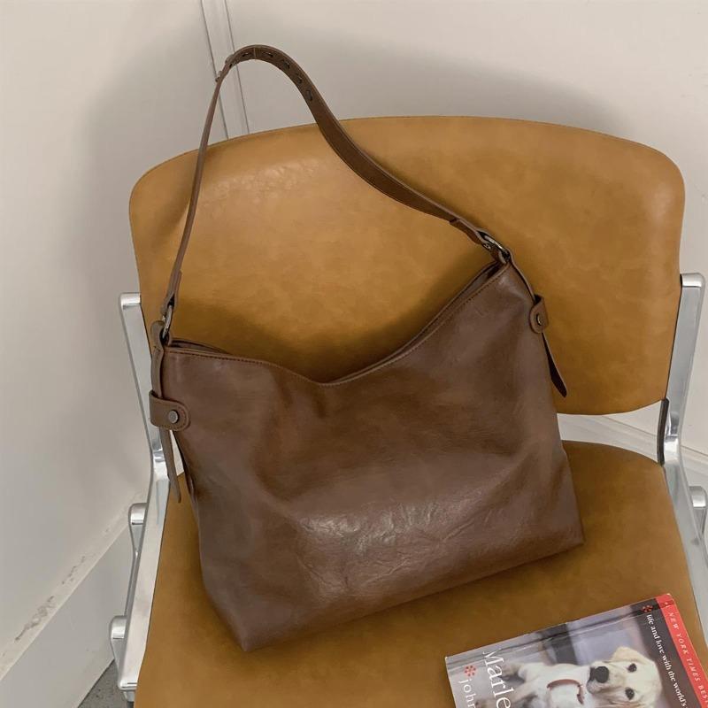 

Retro large-capacity underarm bag women s new trendy fashion tote bag single shoulder crossbody bucket bag коричневий