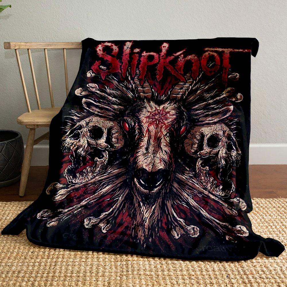 A goat skull with horns, surrounded by detailed skulls and fiery textures. for all seasons blanket lunch break throw gift