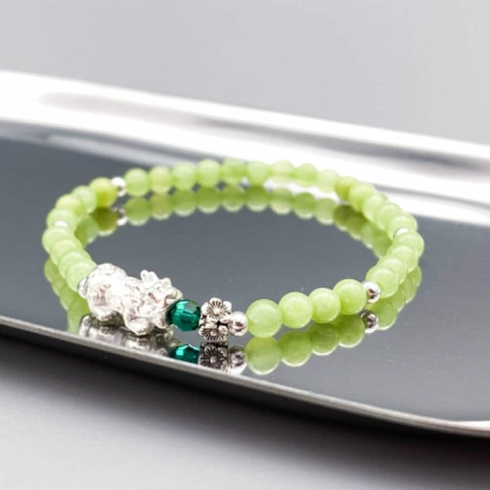 Silver Vihu Peridot Crystal Bracelet with Witch's Workshop Crystal In Its Bite