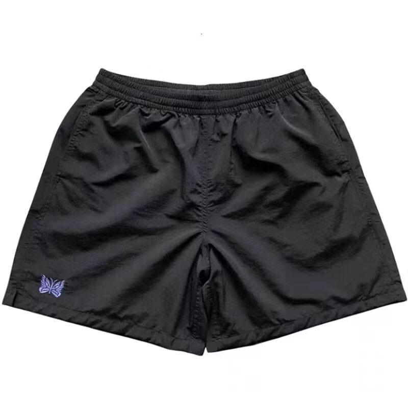 

Мужские летние повседневные шорты быстросохнущие с вышивкой бабочек - длиной до колена, свободные и универсальные M чёрный
