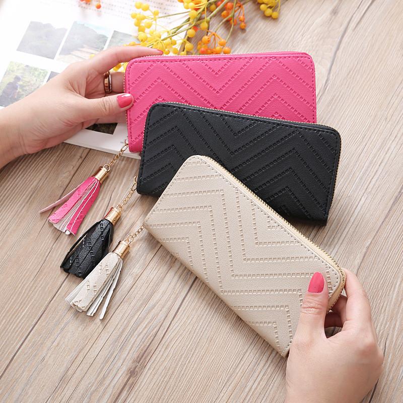 Stylish Long Zipper Wallet For Women With Trendy Tassel Design In Elegant Colors