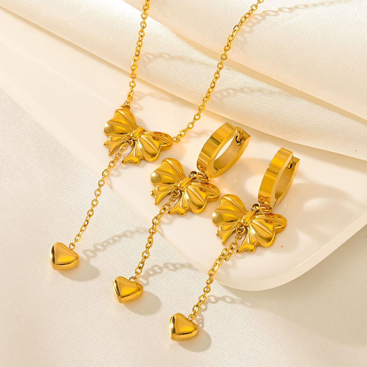 

Ladies Stylish Bow & Heart Tassel Pendant Necklace and Earrings Set