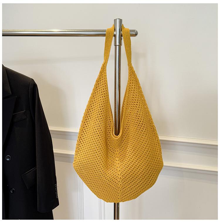 Casual large-capacity cotton thread woven bag, new openwork straw bag, lazy style shoulder bag, vacation beach bag, women's bag