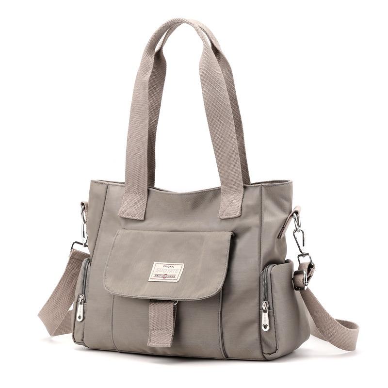 

Women s bag 20 new women s shoulder bag large capacity portable messenger bag nylon bag leisure bag simple and versatile сірий колір