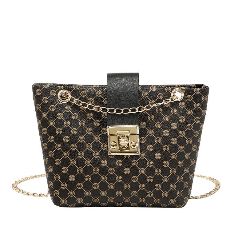 Casual embroidery printing pumping belt lock chain shoulder women's bag new trend versatile bucket bag
