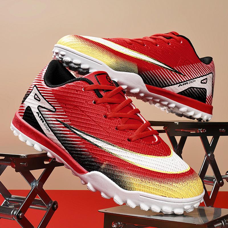 2025 new children's football shoes boys and students girls broken nails Velcro casual game sports shoes
