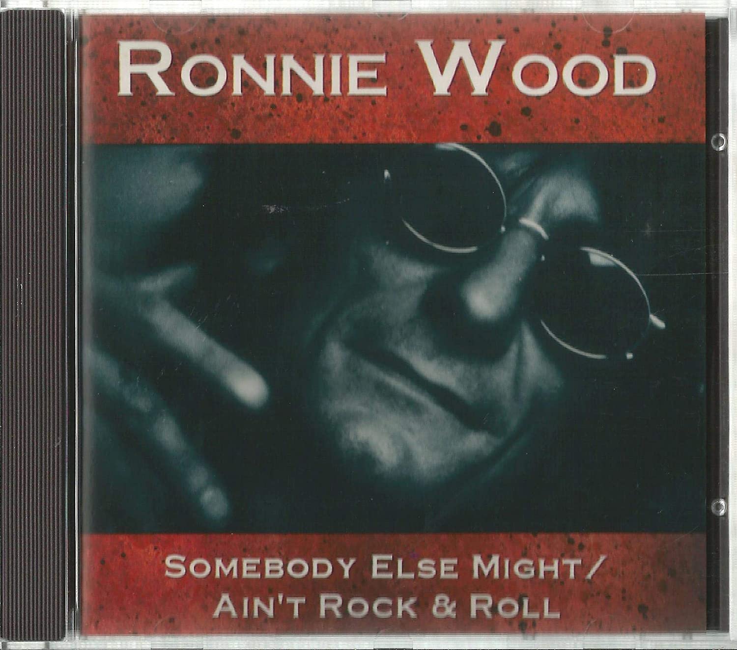 

CD RONNIE WOOD - SOMEBODY ELSE MIGHT 142102 Continuum Recor 1993 US Rock Used