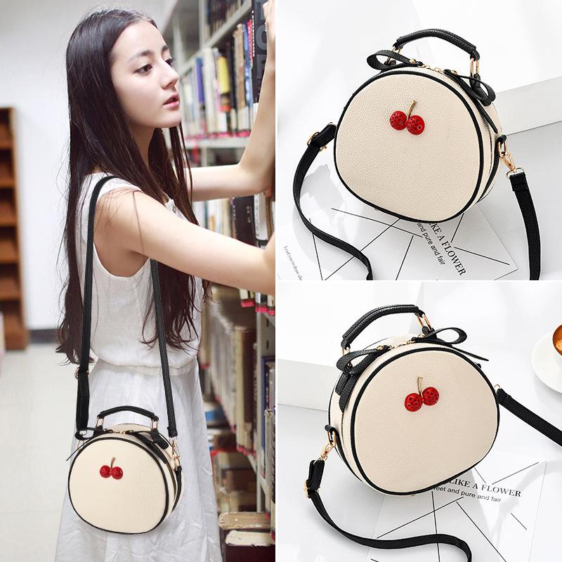 High-value bag women's 2025 new simple and high-end small round bag shoulder messenger bag fashionable portable women's bag tide