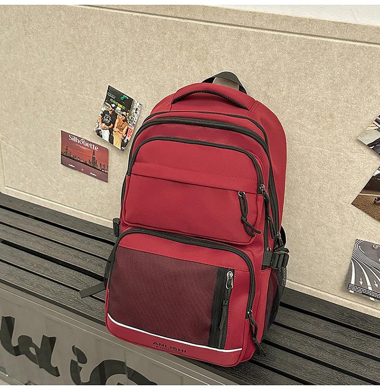 

Школьный рюкзак 2025 новый корейская версия однотонный парный рюкзак большой вместимости многосекционный школьный рюкзак повседневный простой универсальный рюкзак красный