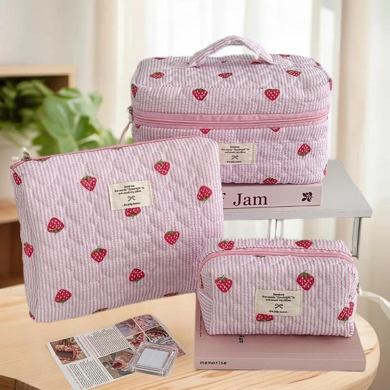 Zippered Cosmetic Pouch for Women, Portable Makeup Organizer in Unique Pink Strawberry Design, Travel-Ready Handbag